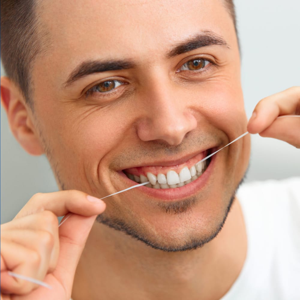 Flossing for Healthy Teeth and Gums